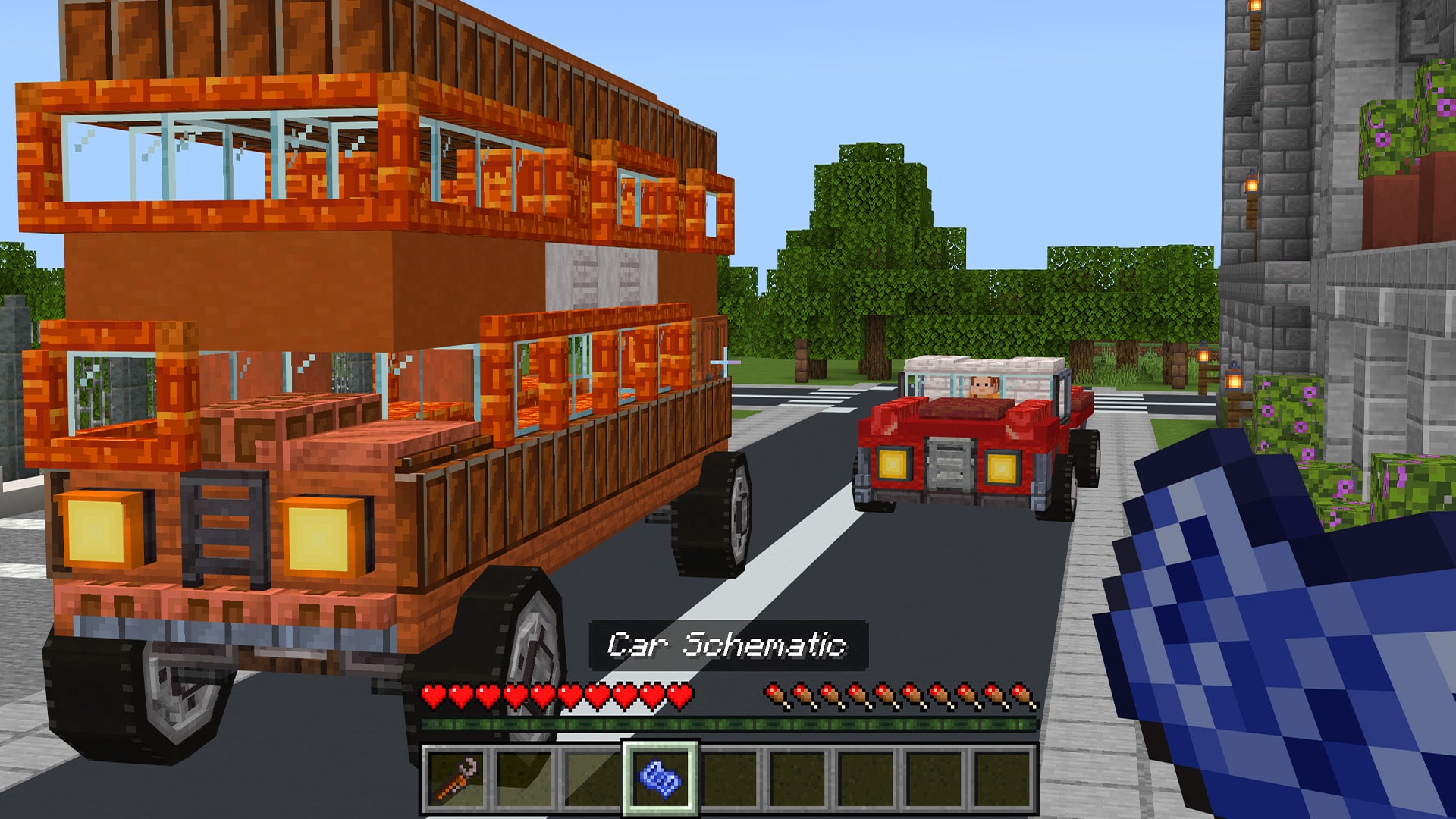 A double-decker bus and a car placed from a schematic